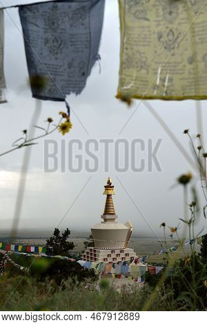 A Beautiful View Of Prayer Flags And A Temple In Crestone, Colorado