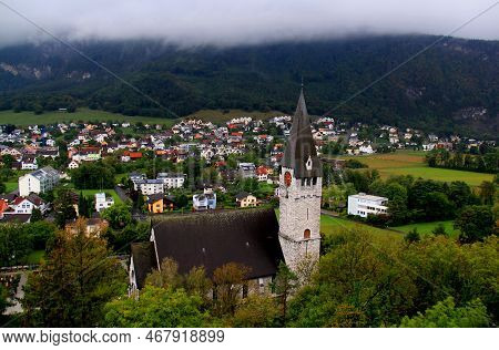 Landscape With A View Of The St. Nicholas Catholic Church And The Descending Fog In The City Of Balz