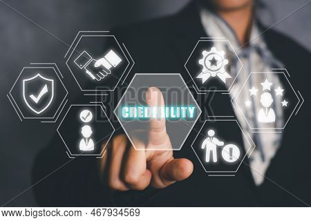 Corporate Credibility Improvement Concept, Business Person Hand Touching Credibility Icon On Virtual