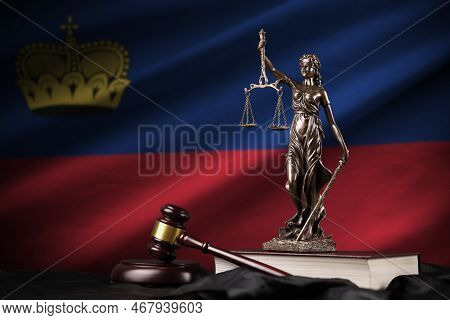 Liechtenstein Flag With Statue Of Lady Justice, Constitution And Judge Hammer On Black Drapery. Conc