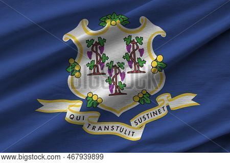 Connecticut Us State Flag With Big Folds Waving Close Up Under The Studio Light Indoors. The Officia