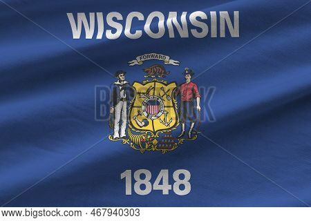 Wisconsin Us State Flag With Big Folds Waving Close Up Under The Studio Light Indoors. The Official 