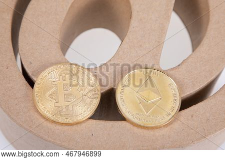 Bordeaux , Aquitaine France - 12 15 2022 : Bitcoin Ethereum Money Golden Coin With 3d Arobase @ Brow