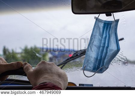 People Have Gotten Into The Habit Of Hanging Covid-19 Masks On The Rearview Mirror Of Their Vehicle'