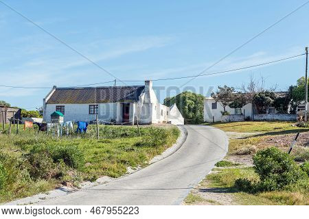Arniston, South Africa - Sep 22, 2022: A Street Scene, With Historic Houses, In Kassiesbaai, An Hist
