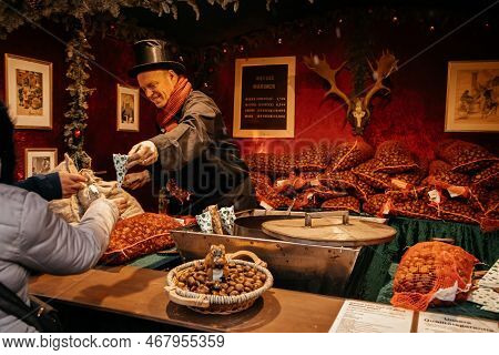 Dresden, Saxony, Germany, 10 December 2022: Christmas Outdoor Market Stall Decorations With Fairy Wi