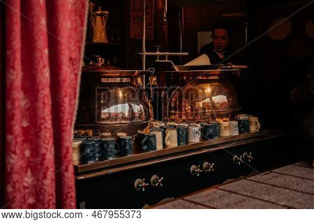Dresden, Saxony, Germany, 10 December 2022: Clay Cups And Barrels For Christmas Mulled Wine In Outdo