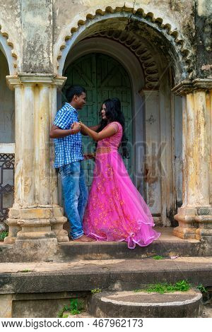 Indian Couple In Love Enjoy A Moment Of Happiness In Old Structure. Bengali Couple On Romantic Mood.