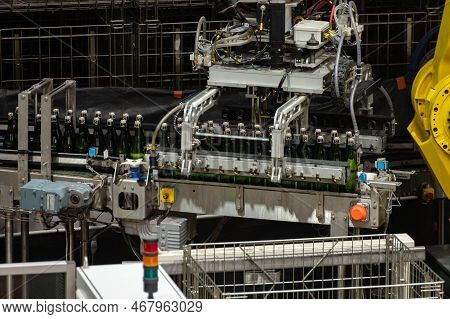 Production Of Cremant Sparkling Wine In Burgundy, France. Automatically Powered Bottling Lines On Fa