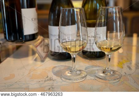 Tasting Of White Dry Chablis Wine In Small Winery In Chablis Town, Burgundy, France