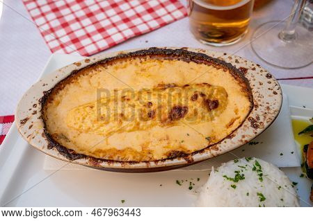Quenelle, Speciality Of Lyon, Oval-shaped Dumplings Filled With Pike White Fish Served In Creamy Sau