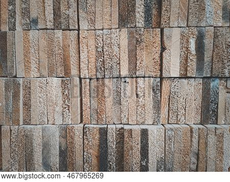 Wooden Texture Background. Stock Pine Wood In Furniture Design Factory. Piles Of Wooden Boards In Sa