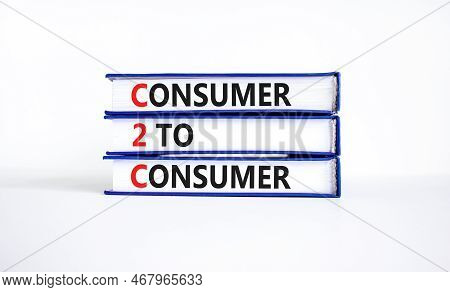 C2c Consumer To Consumer Symbol. Concept Words C2c Consumer To Consumer On Books On A Beautiful Whit