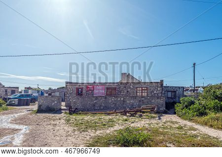 Arniston, South Africa - Sep 22, 2022: A Street Scene, With Felix Cash Store, In Kassiesbaai, Arnist