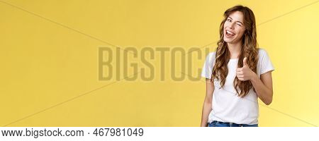 Nice Well Done Mate. Cheerful Outgoing Cheeky Attractive Curly-haired Female Wink Smiling Nod Approv