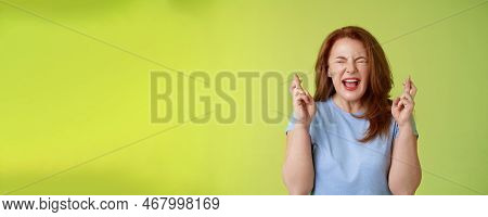 Woman Wants Win Badly. Enthusiastic Lucky Redhead Middle-aged 50s Female Pleading Implore God Make D