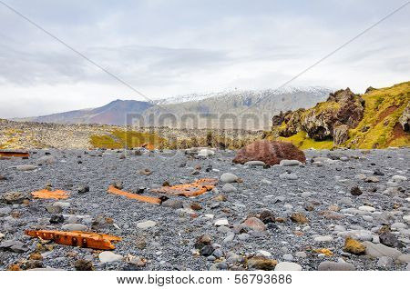 Remains Of A Boat Wreck At The Black Beach On Iceland Snaefellsnes Dritvik