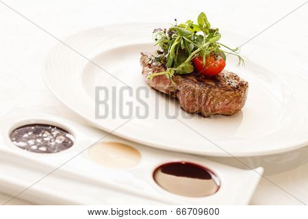 grilled steak with herbs