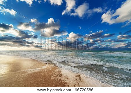 sea coast with waves at sunrise