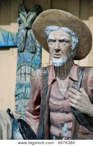 Gamle guldgraver Statue