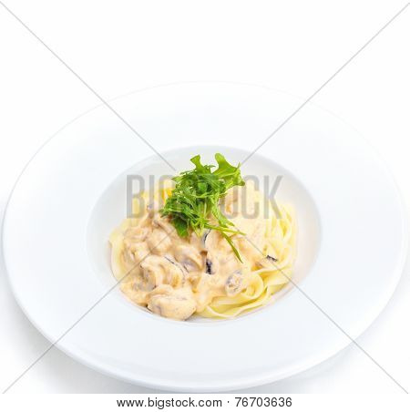 Pasta food with shrimps, herbs and mashrooms isolated on white background in studio