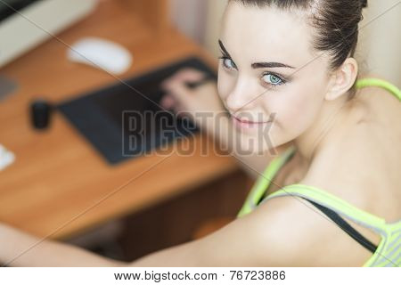 Smiling Happy Female Retoucher At Work