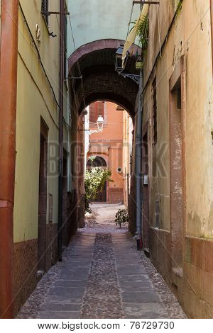 Arch And Houses On The Narrow Streets