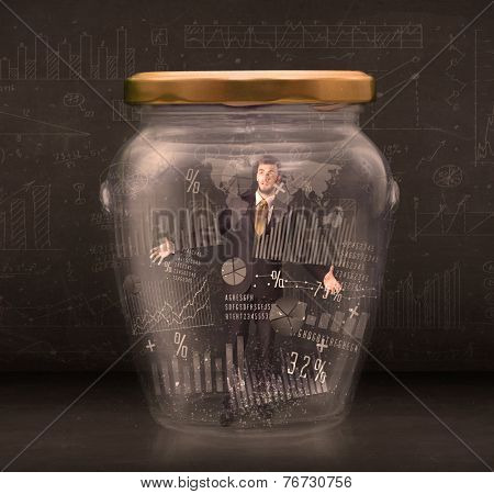 Businessman traped in jar with graph chart symbols concept on background