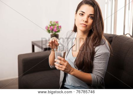 Hungover Girl Taking Antacid