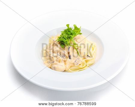 Pasta food with shrimps, herbs and mashrooms isolated on white background in studio
