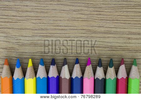 Color Pencil In Wood Background