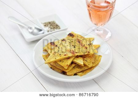 socca, farinata, chickpea pancake with rose wine