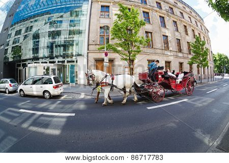 Tourists On A Carriage Ride
