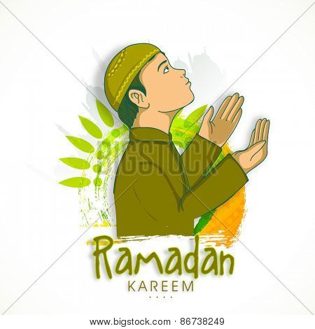 Religious Muslim boy, reading Namaz (Namaz, Muslim prayer) on floral decorated background for Islamic holy month of prayers, Ramadan Kareem.