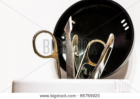 Manicure Accessories In Sterilizer Isolated