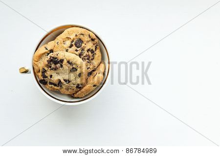 ?ookies With Chocolate Chips In A Vintage Tea Cup
