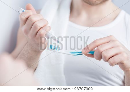 Close-up Of Squeezing Toothpaste