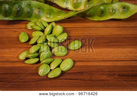Parkia On A Wooden Table, Used As An Ingredient Of Cooking.