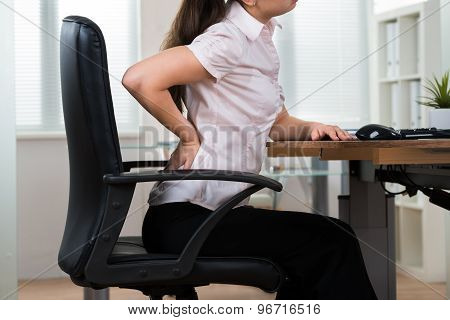 Businesswoman Having Backpain