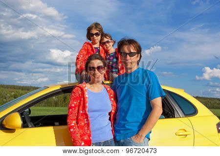 Family car trip on summer vacation, happy parents travel with kids and having fun