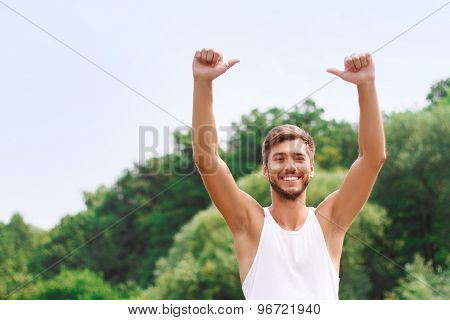 Active guy expressing positivity