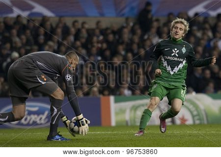 LONDON ENGLAND, November 11 2010: Tottenham's goalkeeper Heurelho Gomes and Werder Bremen's Marko Marin in action during the UEFA Champions League match between Tottenham Hotspur and Werder Bremen