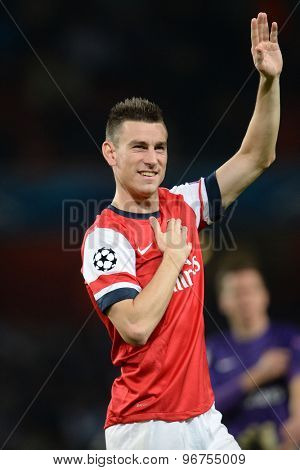 LONDON, ENGLAND - Oct 01 2013: Arsenal's defender Laurent Koscielny from France during the UEFA Champions League match between Arsenal and Napoli.