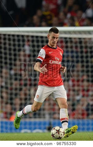 LONDON, ENGLAND - Oct 01 2013: Arsenal's defender Laurent Koscielny from France during the UEFA Champions League match between Arsenal and Napoli.