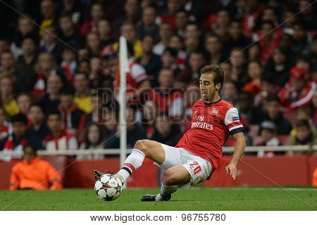 LONDON, ENGLAND - Oct 01 2013: Arsenal's midfielder Mathieu Flamini from France  during the UEFA Champions League match between Arsenal and Napoli.