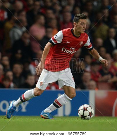 LONDON, ENGLAND - Oct 01 2013: Arsenal's midfielder Mesut Ozil from Germany during the UEFA Champions League match between Arsenal and Napoli.
