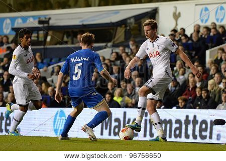 LONDON, ENGLAND - September 19 2013: Tromso's Morten Moldskred and Tottenham's Jan Vertonghen during the UEFA Europa League match between Tottenham Hotspur and Tromso played at The White Hart Lane
