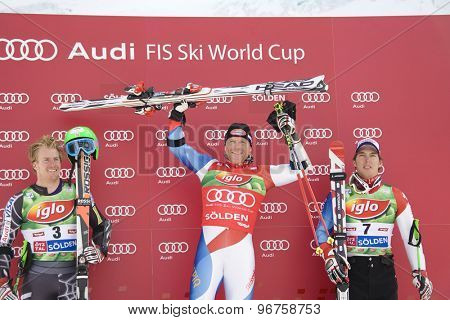 SOELDEN, AUSTRIA Oct 25 2009 Ted Ligety (USA) left, Didier Cuche (SUI) and Carlo Janka (SUI) right, on the podium after finishing 2nd in the mens giant slalom race at the Rettenbach Glacier.