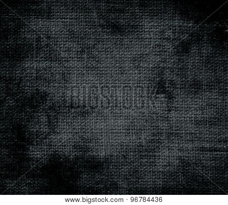 Grunge background of dark gunmetal burlap texture