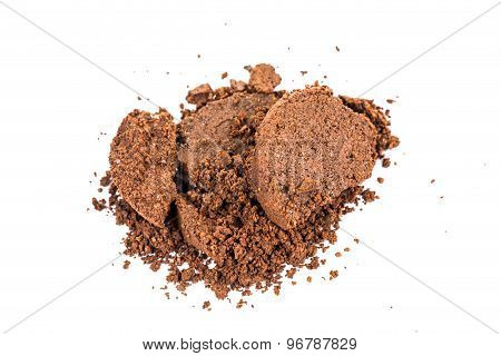 Spent or used coffee grounds in white background